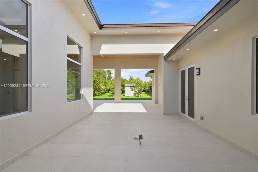 Exterior details and patio area of a home in , Miami (Image 38). Exterior details and patio area of a home in , Miami (Image 38).