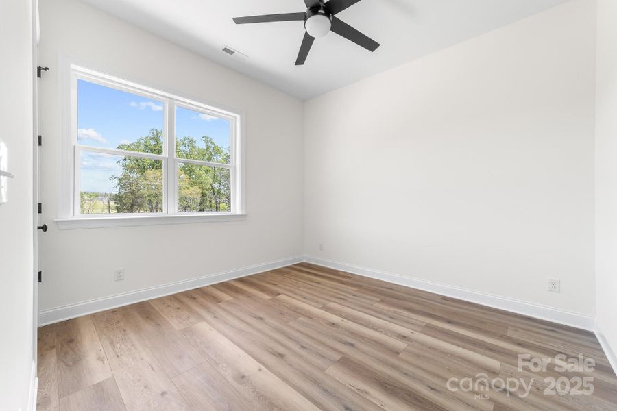 Spacious, unfurnished interior of a new home in , Bessemer City (Image 32).