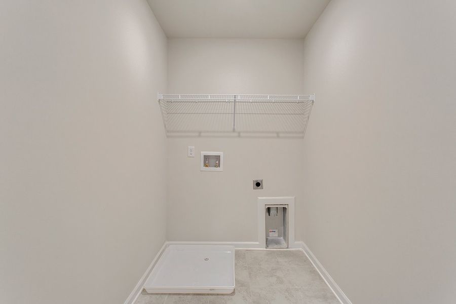 A white room with a white wall.