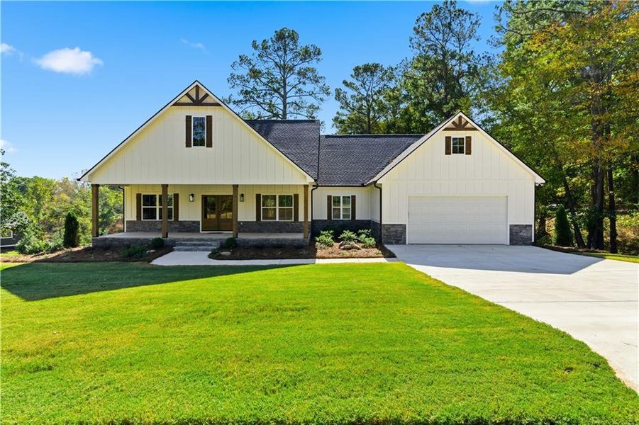 Front exterior of a new home in , Dallas, GA, highlighting curb appeal (Image 25).