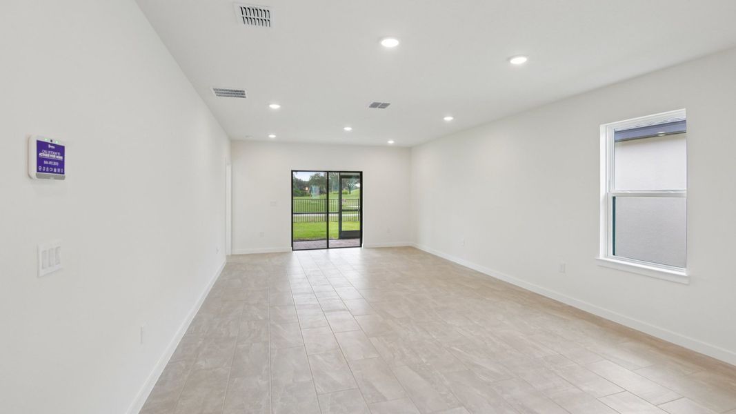 Furnished interior view inside a new home in Grasslands West, Lakeland (Image 7).