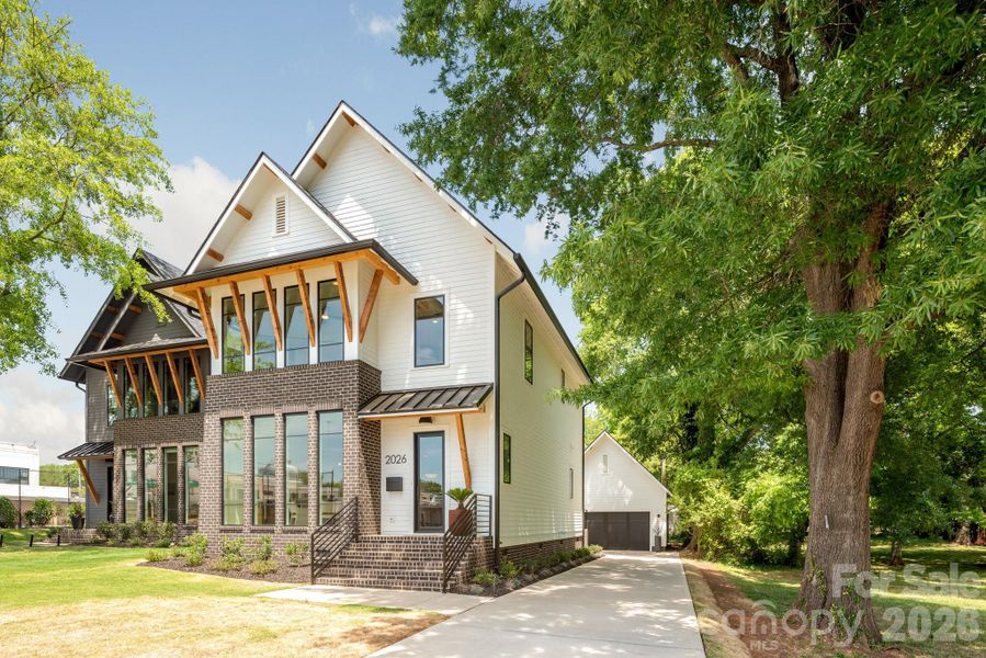Front exterior of a new home in , Charlotte, NC, highlighting curb appeal (Image 23).