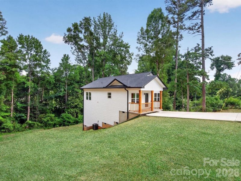 Exterior details and patio area of a home in , Hickory (Image 33).