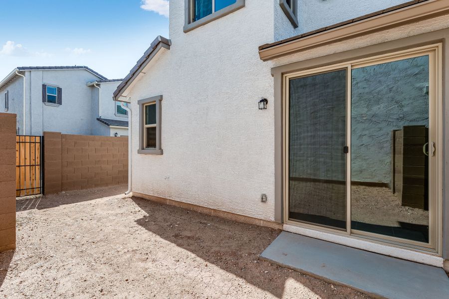 Front exterior of a new home in Avila at Rancho Mercado, Surprise, AZ, highlighting curb appeal (Image 20). Front exterior of a new home in Avila at Rancho Mercado, Surprise, AZ, highlighting curb appeal (Image 20).