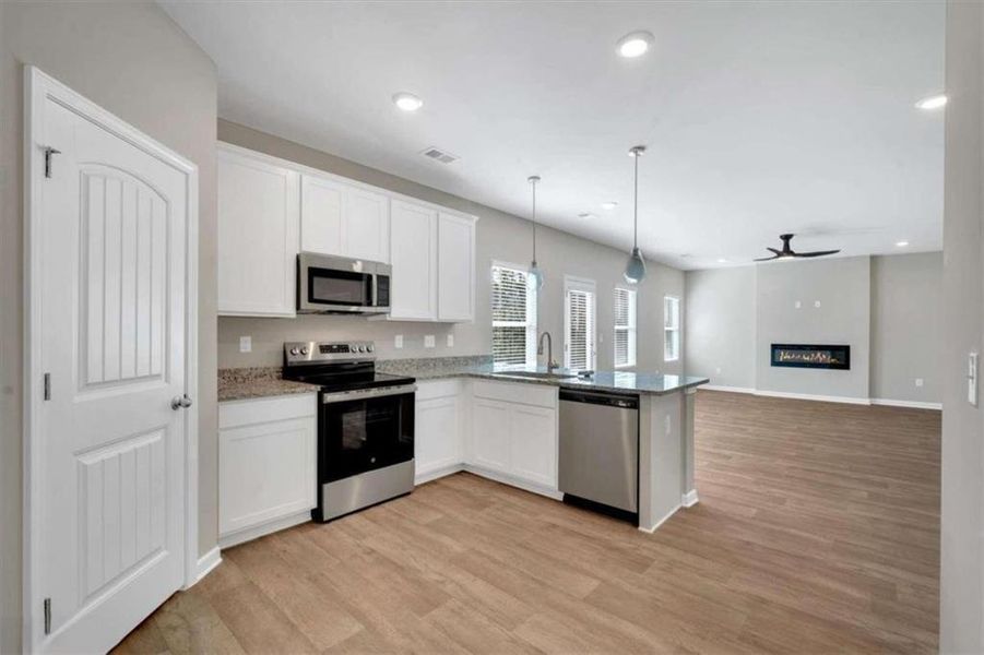 Furnished interior view inside a new home in , Covington (Image 3).