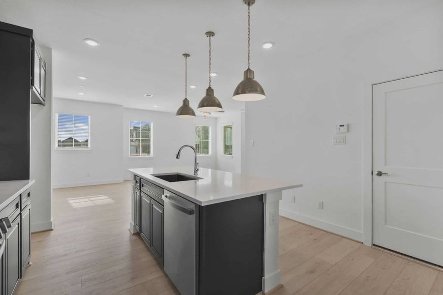 Representative furnished interior of a home built from the Riverdale by Chesmar Homes in Meridiana Courtyard Collection, Manvel (Image 8).