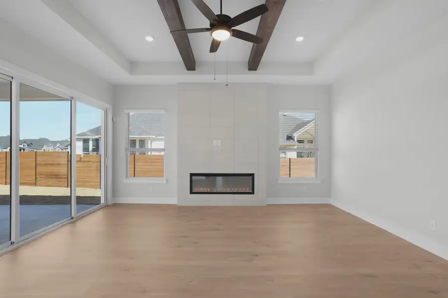 Representative unfurnished interior of a home built from the Samantha by Chesmar Homes in Lariat, Liberty Hill (Image 7).