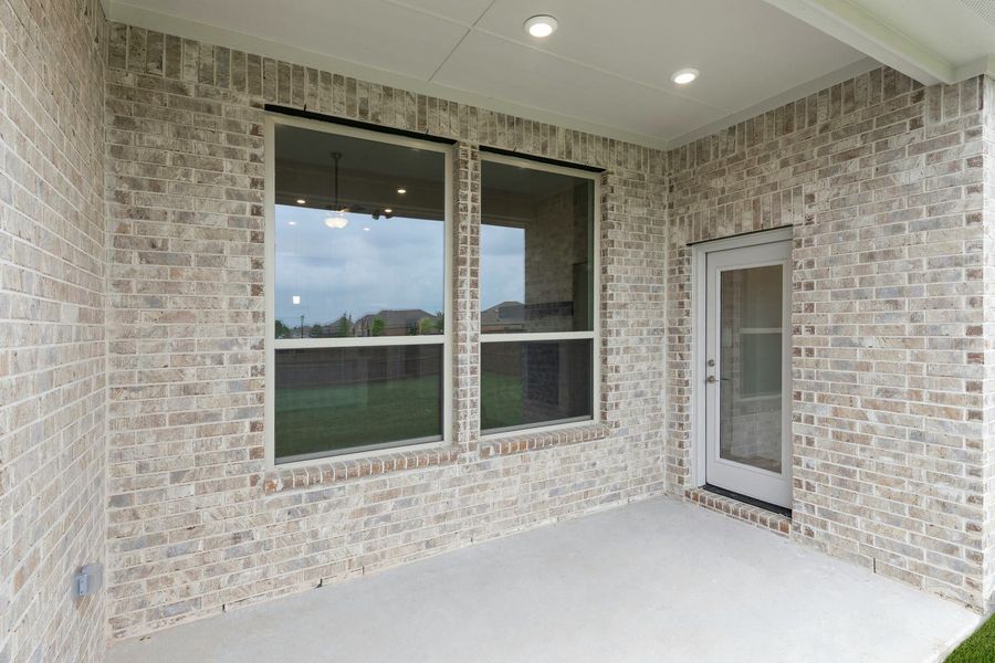 Exterior details and patio area of a home in Park Trails, Forney (Image 3).