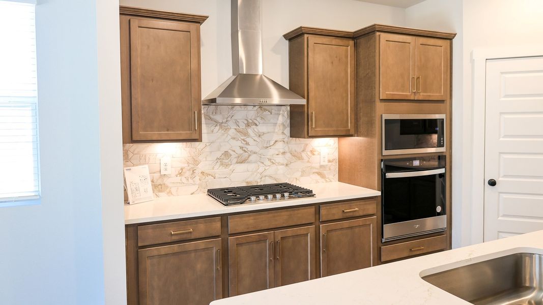 Representative furnished interior of a home built from the EMBRY by D.R. Horton in Harvest Point, Spring Hill (Image 10).