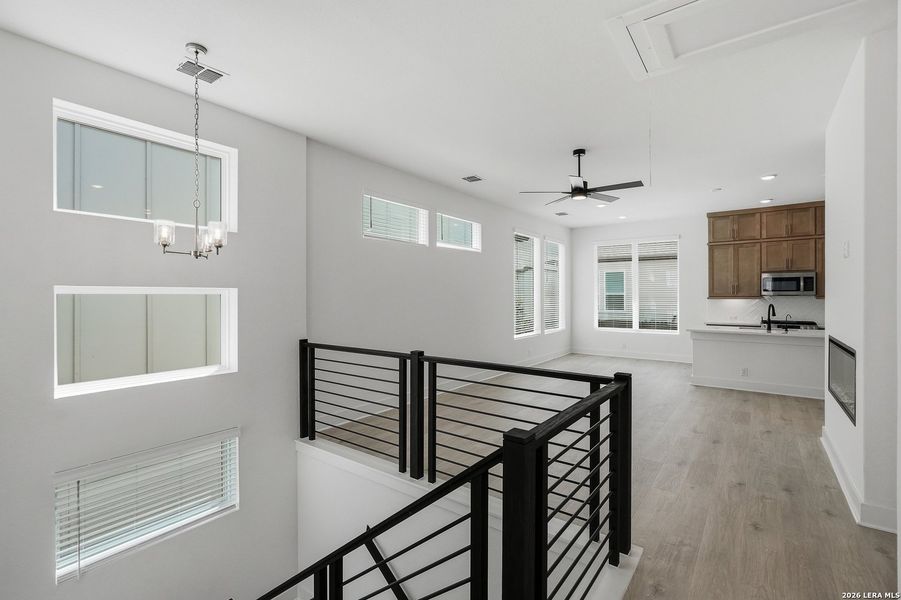 Spacious, unfurnished interior of a new home in Centero at Stone Oak, San Antonio (Image 20).