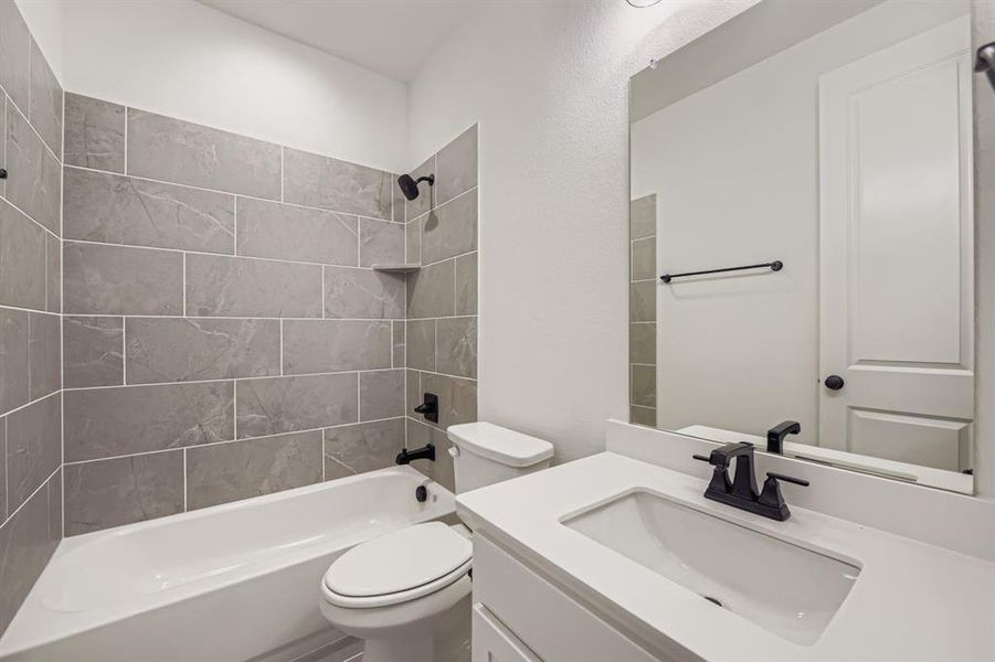 Full bath with shower / bath combination and vanity