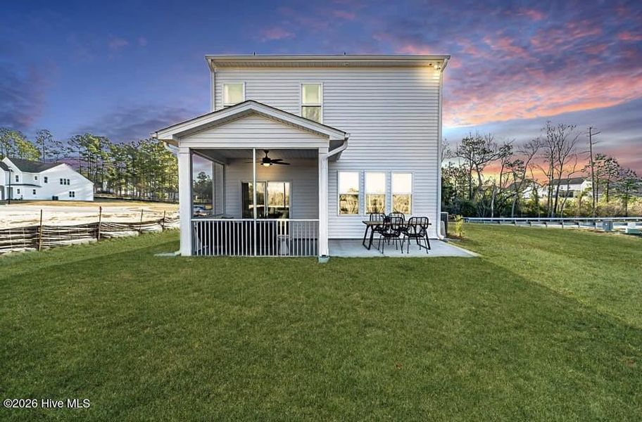 Exterior details and patio area of a home in Coastal Haven, Leland (Image 26).