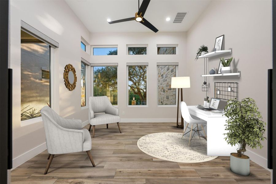 Office featuring ceiling fan and light hardwood / wood-style flooring