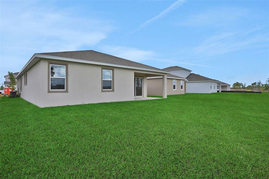 Exterior details and patio area of a home in Turnleaf, Punta Gorda (Image 2).