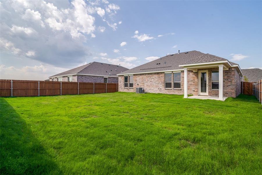 Front exterior of a new home in Heartland Signature, Crandall, TX, highlighting curb appeal (Image 2). Front exterior of a new home in Heartland Signature, Crandall, TX, highlighting curb appeal (Image 2).