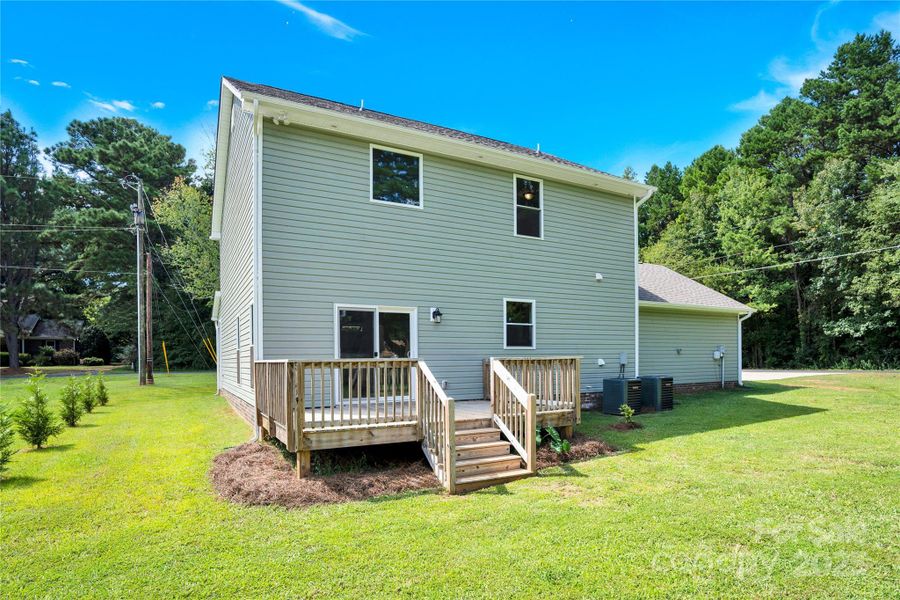 Front exterior of a new home in , Huntersville, NC, highlighting curb appeal (Image 25).