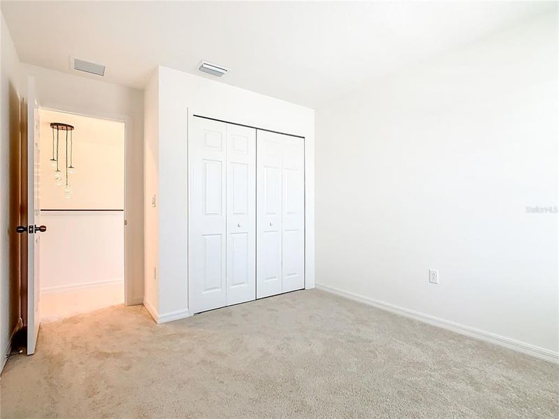 Spacious, unfurnished interior of a new home in Horse Creek at Crosswinds, Davenport (Image 22).