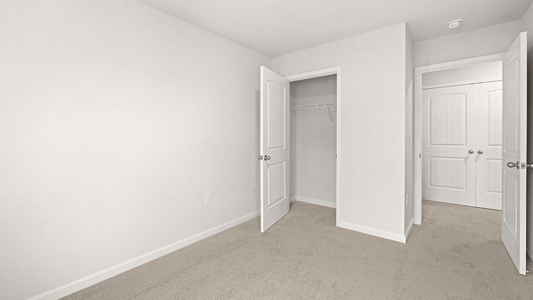 Spacious, unfurnished interior of a new home in Woodbury Park, South Fulton (Image 31).