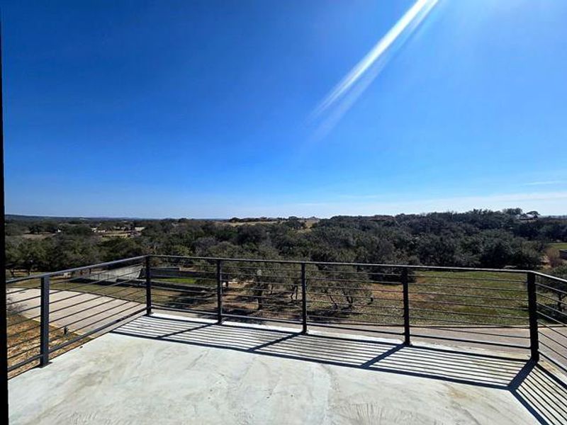 View of patio / terrace featuring a view of trees
