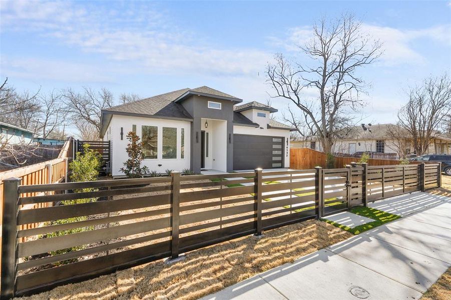 Front exterior of a new home in , Dallas, TX, highlighting curb appeal (Image 24).