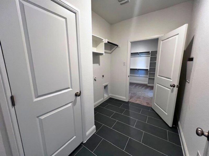 Primary closet connects to laundry Primary closet connects to laundry