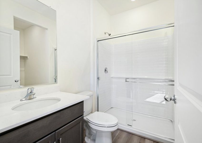 The walk-in shower creates a luxury feel in this bathroom.