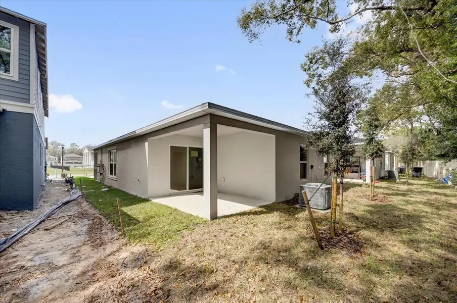 Exterior details and patio area of a home in Wilder Pines, Lakeland (Image 3). Exterior details and patio area of a home in Wilder Pines, Lakeland (Image 3).