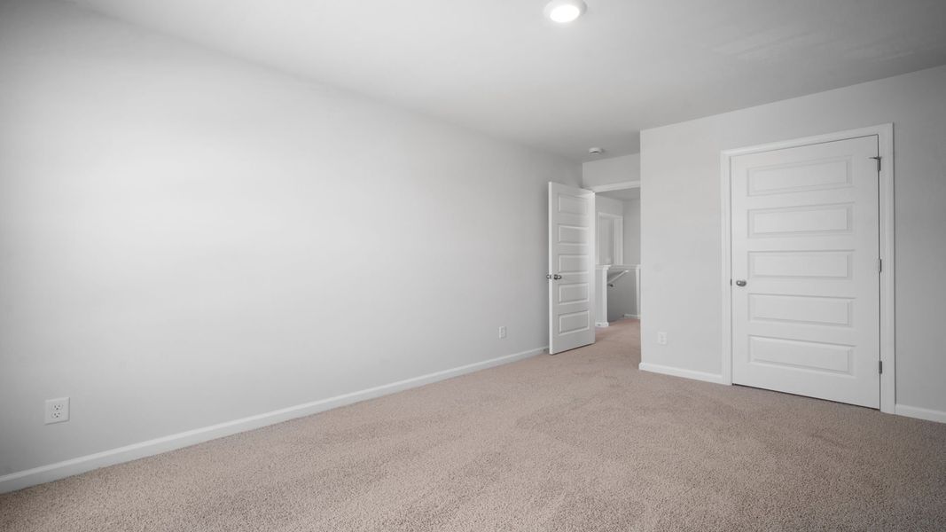 Spacious, unfurnished interior of a new home in The Lakes at North Glynn, Brunswick (Image 22).