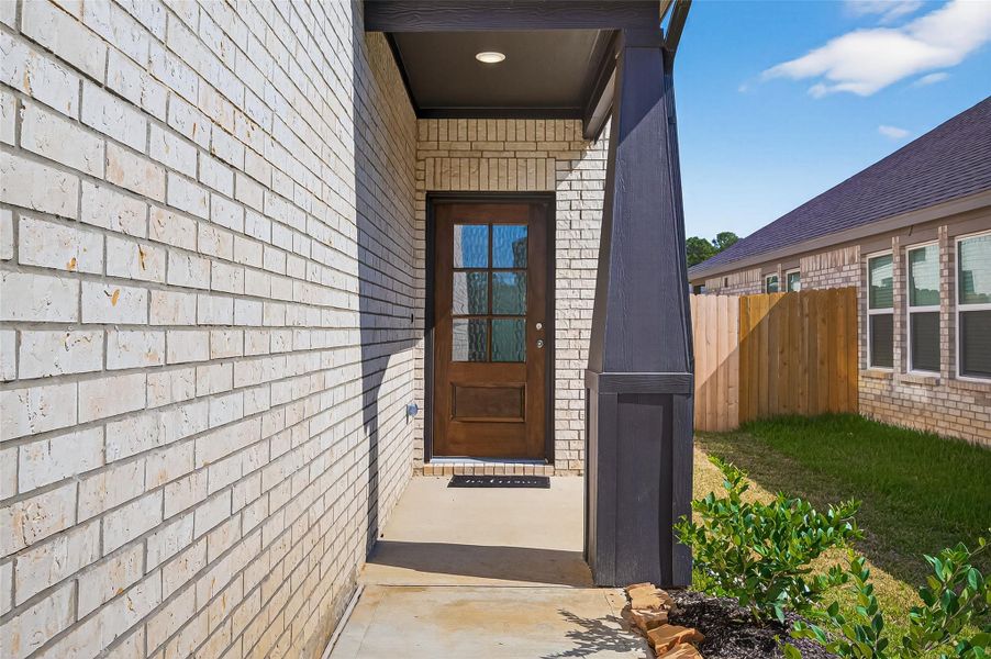 Exterior details and patio area of a home in Mill Creek Trails, Magnolia (Image 3). Exterior details and patio area of a home in Mill Creek Trails, Magnolia (Image 3).