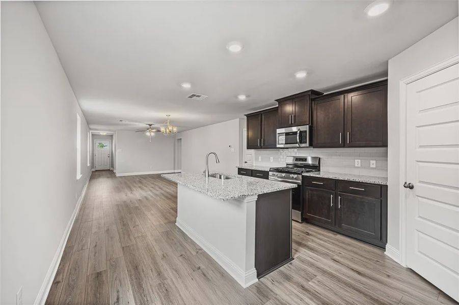 Furnished interior view inside a new home in Stonebrooke, Conroe (Image 4).