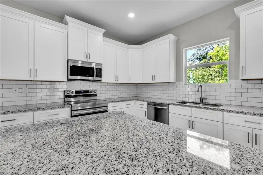 Furnished interior view inside a new home in , Punta Gorda (Image 14).