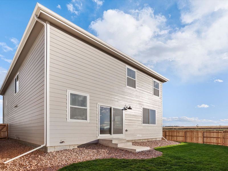 Exterior details and patio area of a home in Lorson Ranch: The Trail Collection, Colorado Springs (Image 2). Exterior details and patio area of a home in Lorson Ranch: The Trail Collection, Colorado Springs (Image 2).
