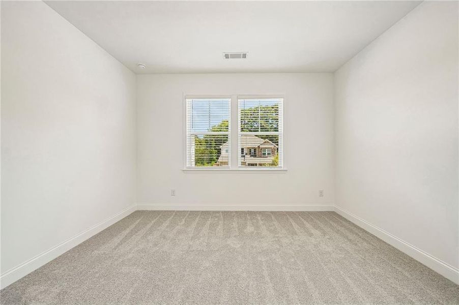 Spacious, unfurnished interior of a new home in Bennett Farm, Loganville (Image 34).