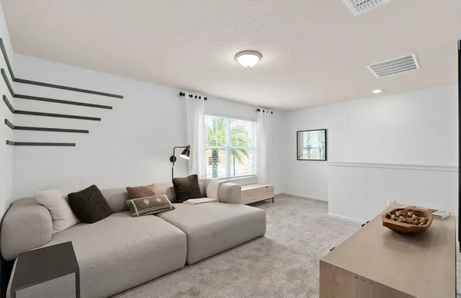 Representative furnished interior of a home built from the Mill Run by Pulte Homes in Waypointe, Port Orange (Image 16).