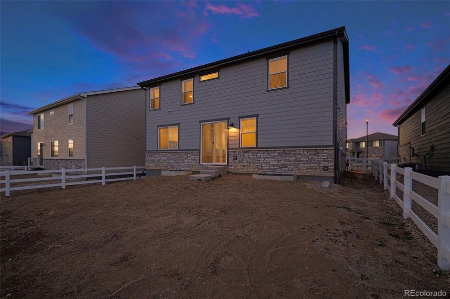 Exterior details and patio area of a home in Murphy Creek, Aurora (Image 29).