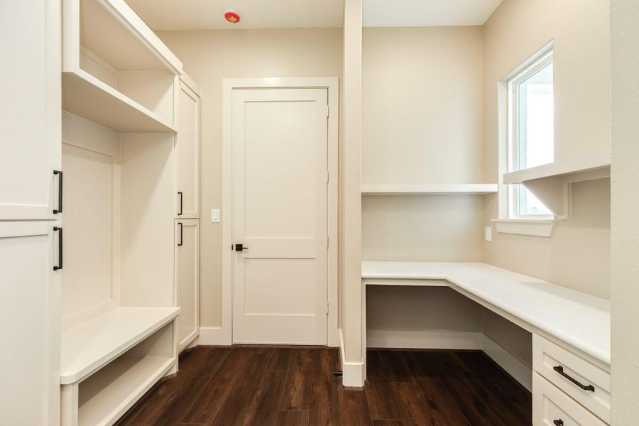 The mudroom/ work space is an ideal space that is versitile and flexible for anyones needs.