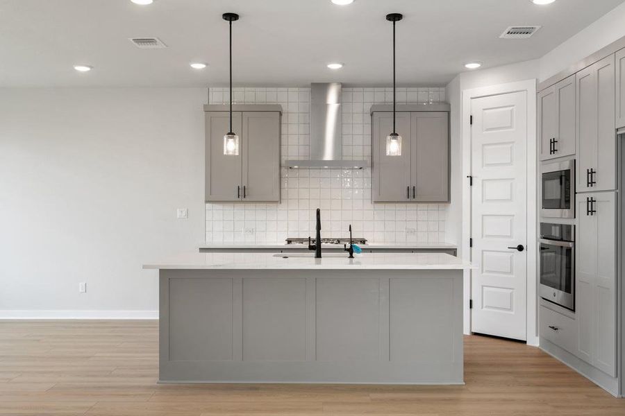 Furnished interior view inside a new home in Terrace Collection at Heritage, Dripping Springs (Image 8). Furnished interior view inside a new home in Terrace Collection at Heritage, Dripping Springs (Image 8).