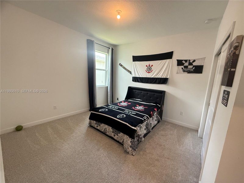 Furnished interior view inside a new home in Tradition, Port St. Lucie (Image 50).