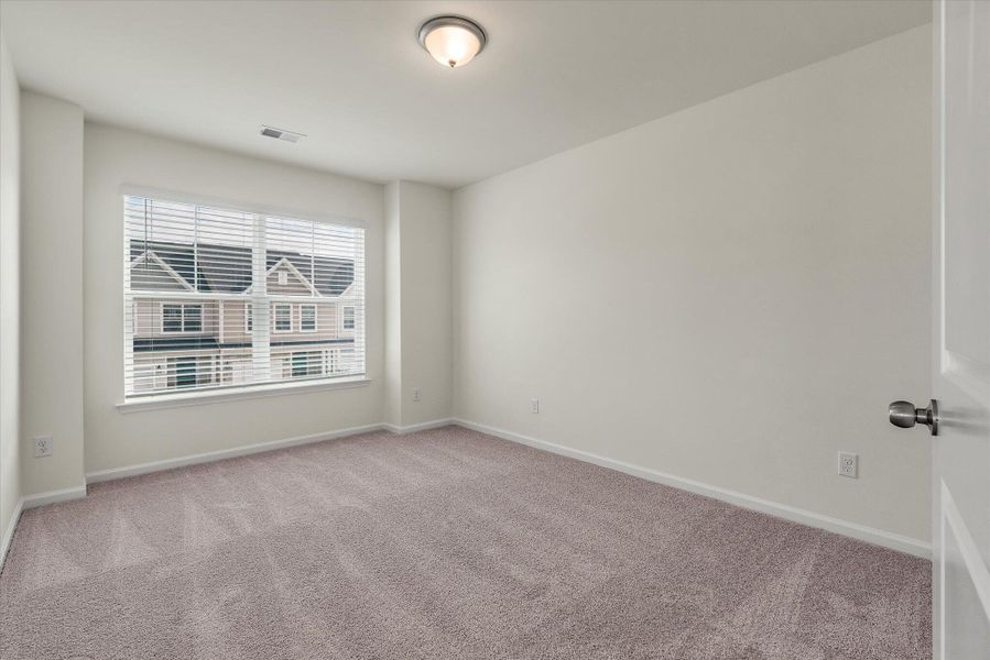 Spacious, unfurnished interior of a new home in The Landings at Montague, Goose Creek (Image 40).