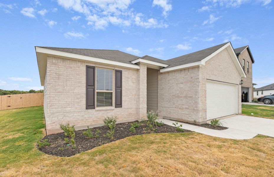 Front exterior of a new home in County View, Temple, TX, highlighting curb appeal (Image 21). Front exterior of a new home in County View, Temple, TX, highlighting curb appeal (Image 21).
