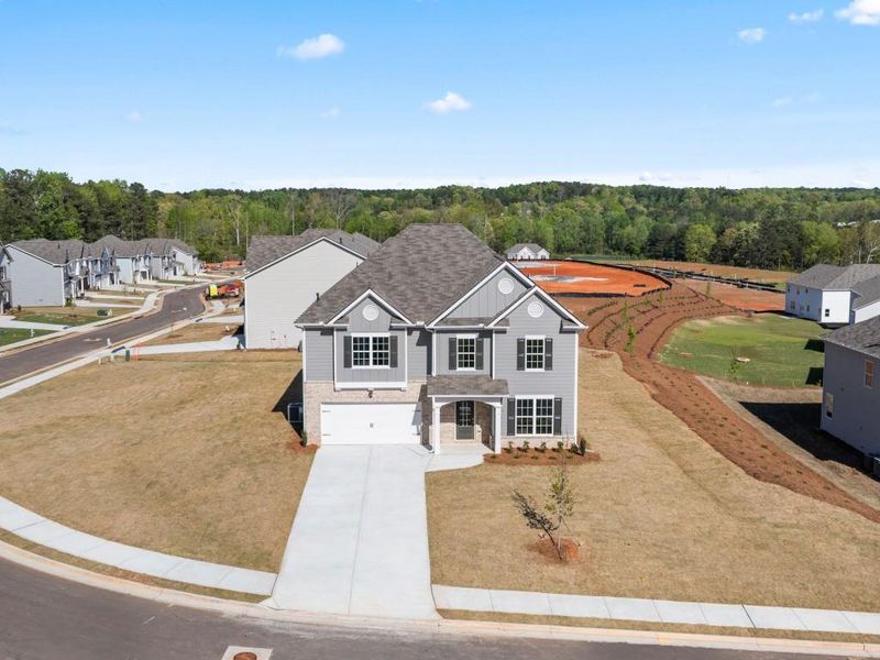 Front exterior of a new home in Thompson Ridge, Dallas, GA, highlighting curb appeal (Image 18).