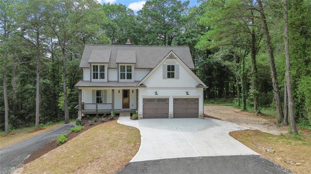 Front exterior of a new home in , Canton, GA, highlighting curb appeal (Image 30).