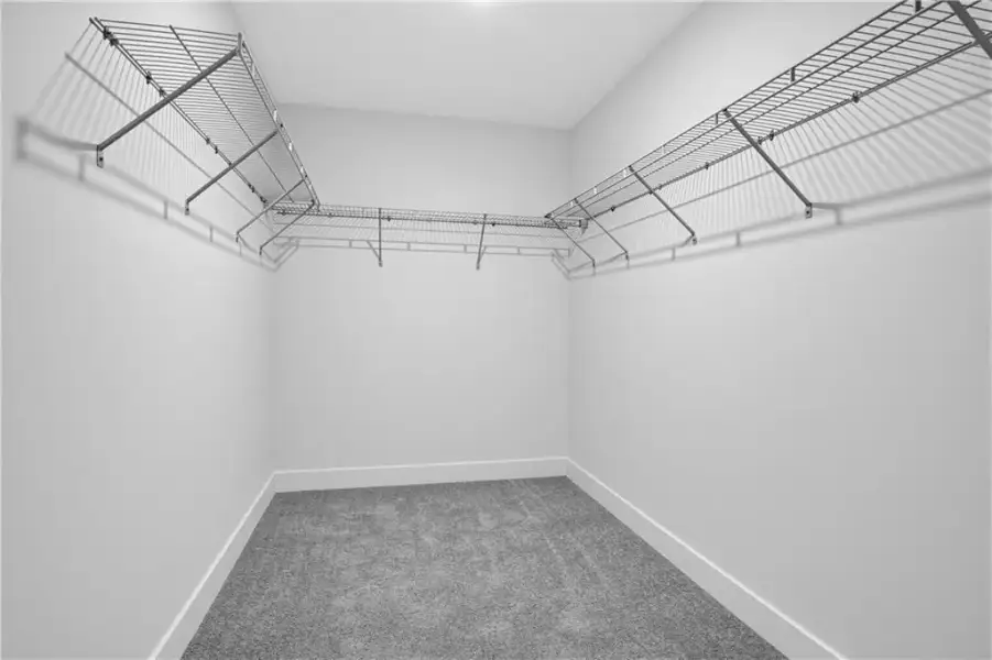 Spacious, unfurnished interior of a new home in Towns at Holly Springs, Holly Springs (Image 23).