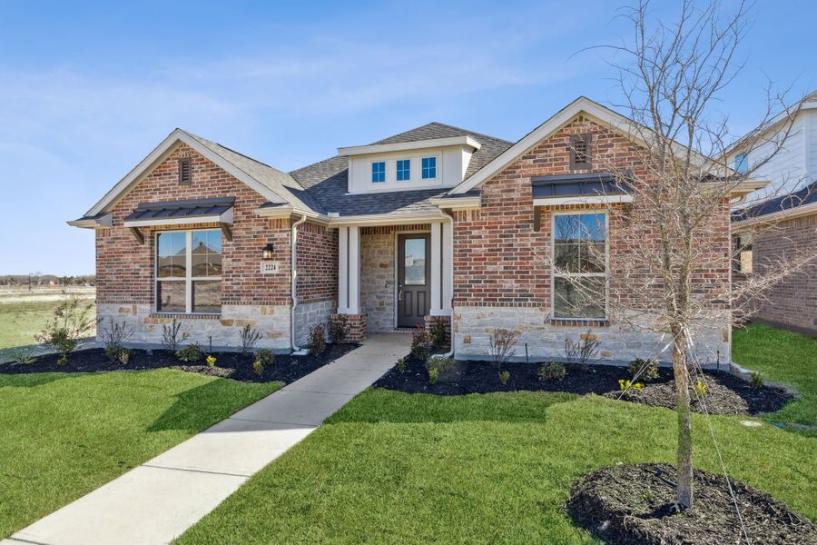 Representative exterior photo of a completed home built from the Cardinal by Centre Living Homes in Dove Hollow, Waxahachie, TX (Image 26).