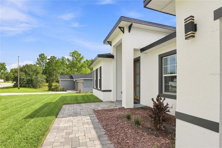 Exterior details and patio area of a home in , Ocala (Image 27).