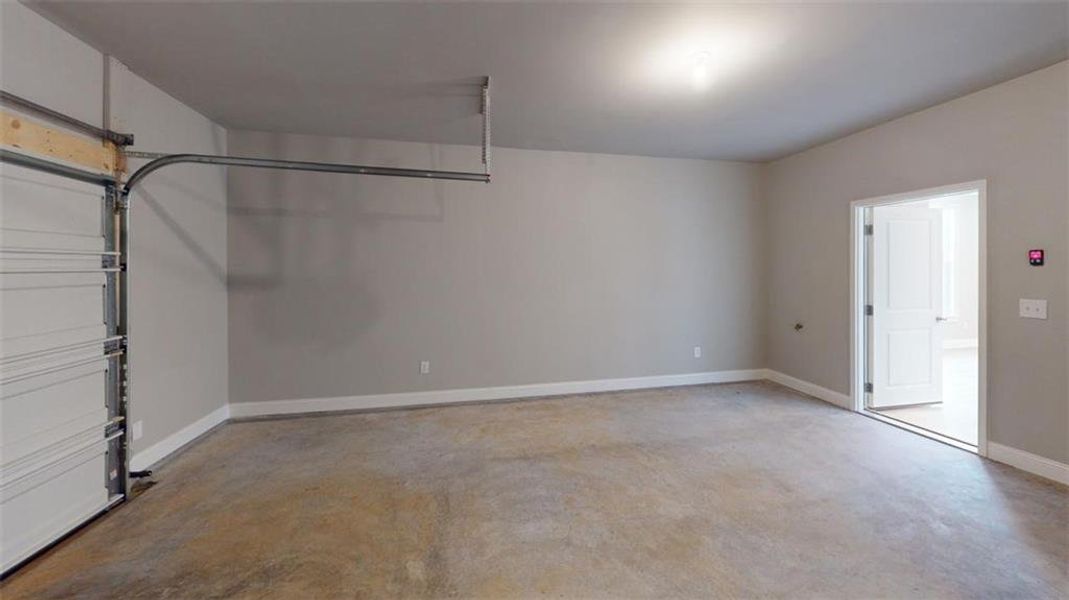 Spacious, unfurnished interior of a new home in The Courtyards at Redbud Lane, Holly Springs (Image 15).