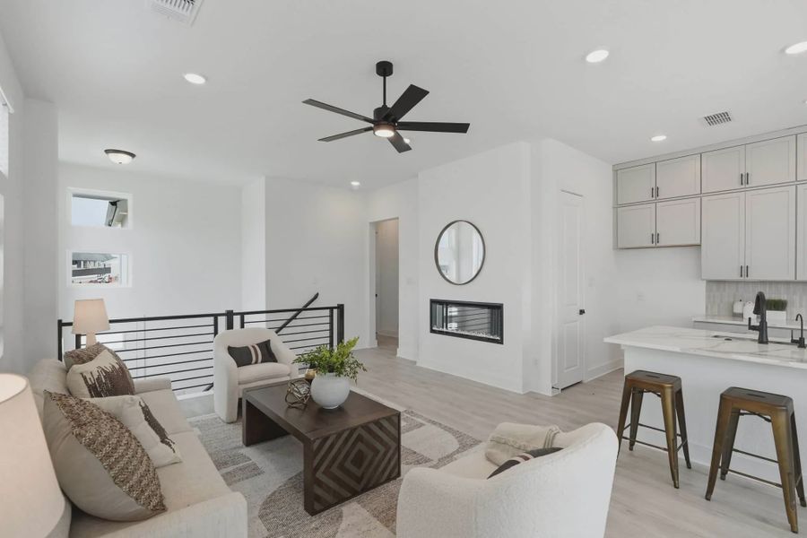 Furnished interior view inside a new home in Rose Hill, San Antonio (Image 6).