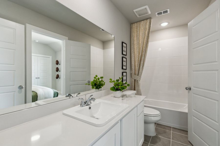 Bathroom in the Willow home plan by Trophy Signature Homes – REPRESENTATIVE PHOTO