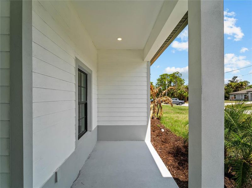 Exterior details and patio area of a home in , North Port (Image 41).