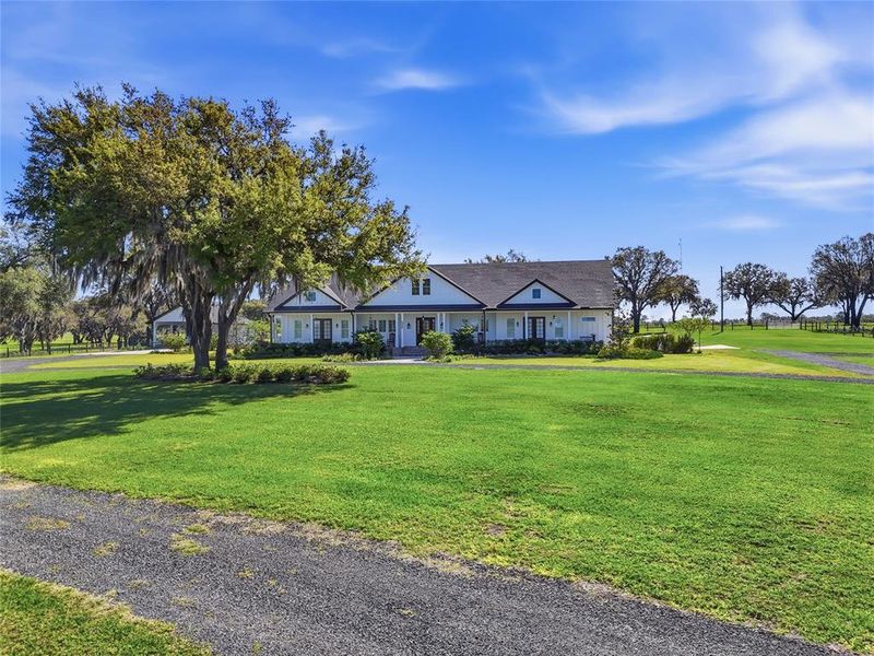 Front exterior of a new home in , Bronson, FL, highlighting curb appeal (Image 21).